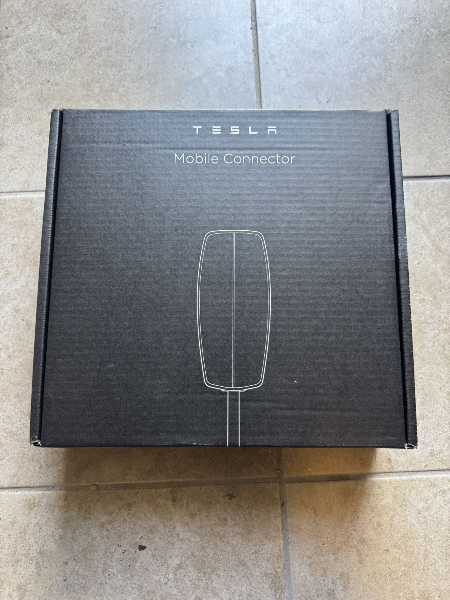 Brand new Tesla mobile connector 