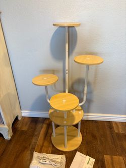 Plant stand with grow light