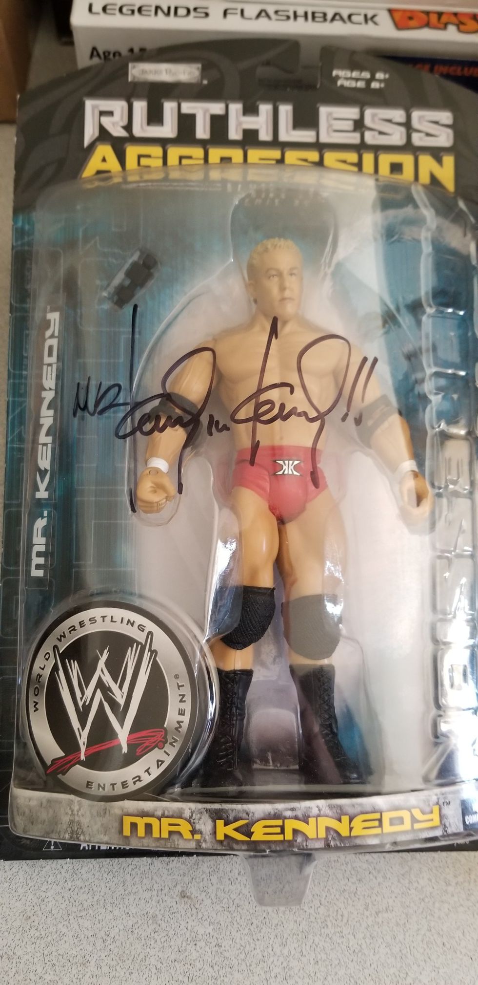 WWE authentic autographed action figures