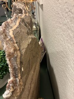 calcite, sitting on a druzy quartz/chalcedony-rich matrix.