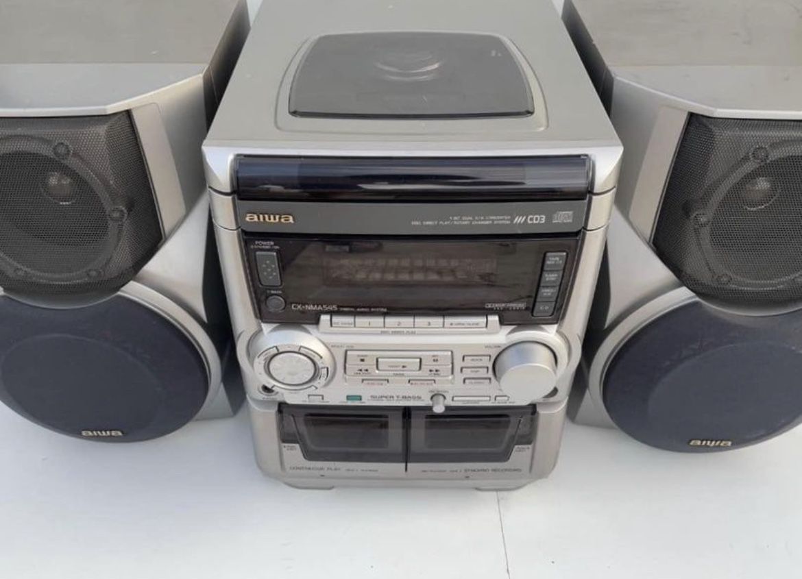 TRADE Aiwa 1999 Stereo System CX-NMA545U & 2 Aiwa Speakers Model No. SX-WNA555