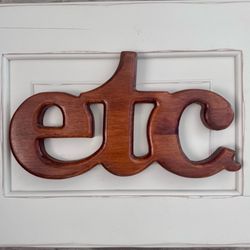 Vintage 70s carved solid wood etc. hanging sign.  11 3/4” wide x 6 1/2” tall x 3/4” thick  Has metal Hanger on the back