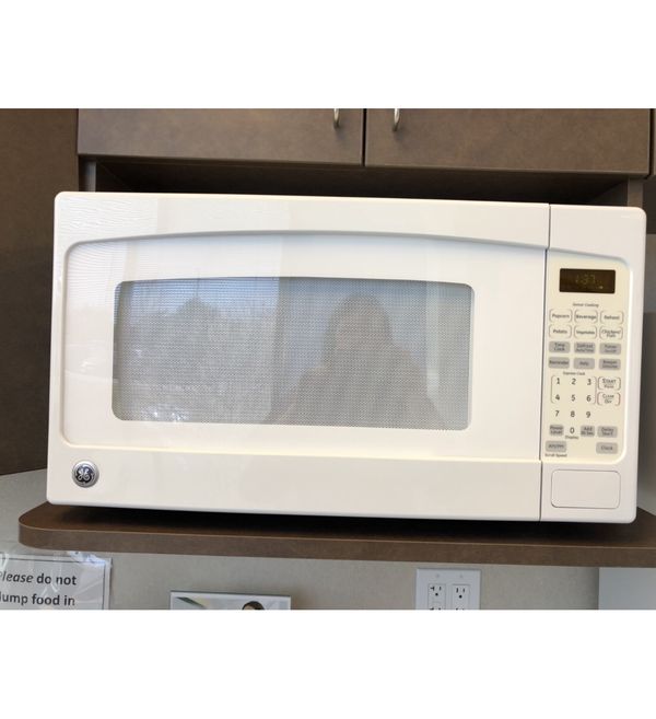 Ge 2 Cu Ft 1200 Watt Countertop Microwave White For Sale In