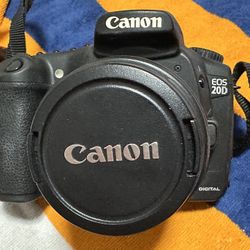 Canon EOS 20D digital camera with additional lens