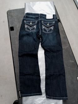 Girls size one teen or little girls size 1 Baker Street denim never been worn brand new super cool design and stitching