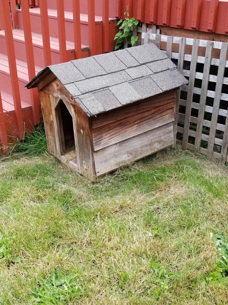 Wood dog house. Good condition. Small to medium dog.