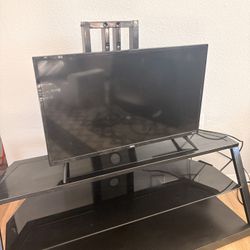Glass Black Tv Stand And Tv 