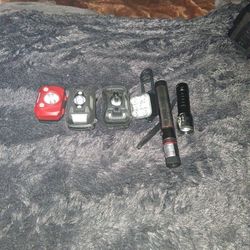 Lights The Long One Is Green Lazir So.e Take Battery  But Mostly A Charger