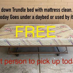 Trundle Bed With Mattress  FREE. ITS GOING TO A THRIFT STORE BY THE END OF THE DAY