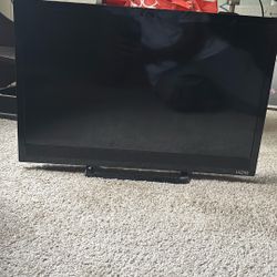 24in Tv With The Remote 