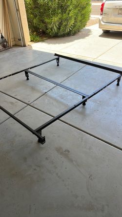Metal frame for a king or queen size bed 76 inches wide by 72 inches long