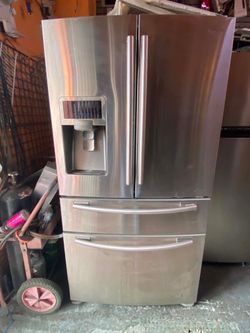 SAMSUNG REFRIGERATOR 4 DOORS, STAINLESS STEEL. FREE DELIVERY AND INSTALLATION