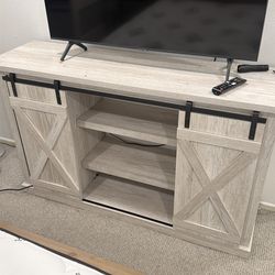Farmhouse TV console with sliding door doors