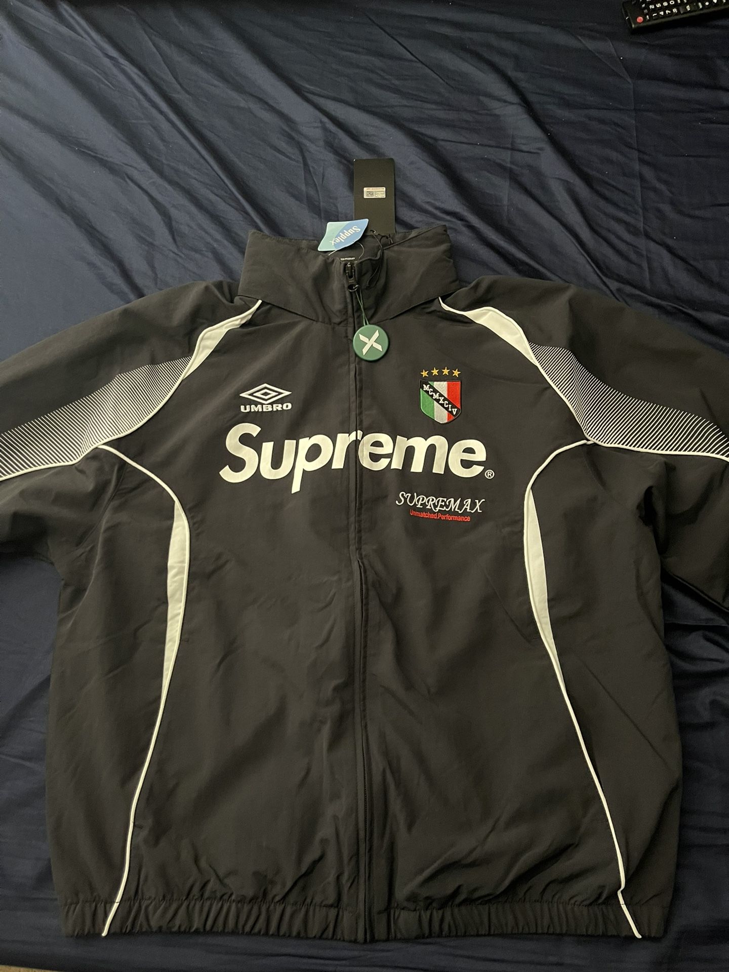 selling supreme x umbro track jacket (new)