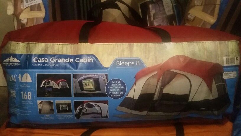 8 person tent with projection screen, 7ft max peek, and room divider
