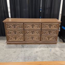 Ornate Carved Brown Wood Nine-Drawer Dresser