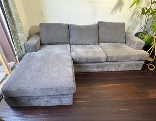 FREE DELIVERY! Living spaces Bonaterra Sofa with Reversible Chaise (charcoal gray)