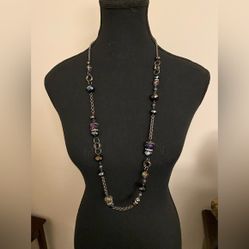 Long beaded chain. 