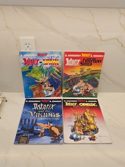 Set of 4 Asterix Comic Books: In Spain, Chieftain's Shield, and the Vikings, & Obelix's Birthday