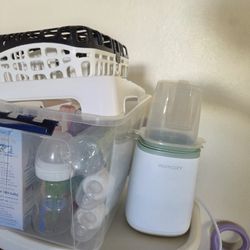NEW / USED ONCE BOTTLES , PLUS MOMCOZY BOTTLE WARMER 
