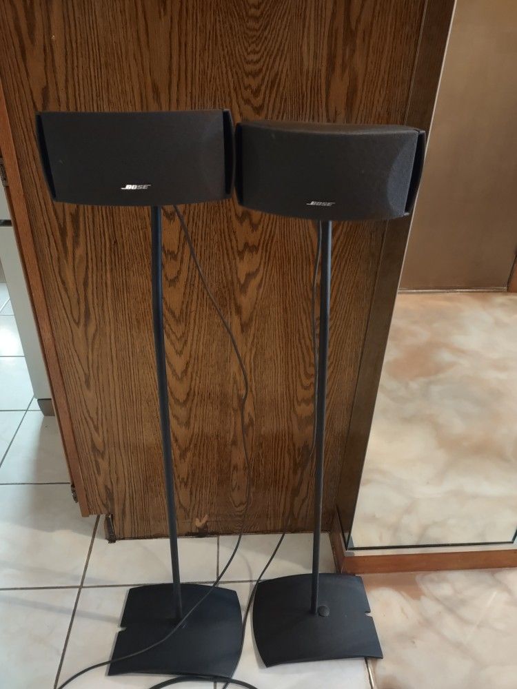 2 Bose Speaker Stands And 2 Bose Speakers