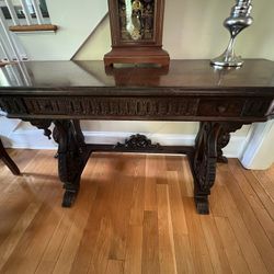 Antique Carved Wood Game table/Console in Good Condition   Opens Up To Table. Moving Must Sell. 