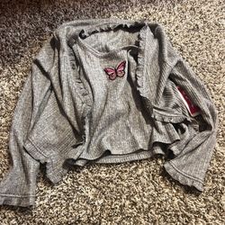 Girl’s butterfly justice sweater. New! Size 7/8
