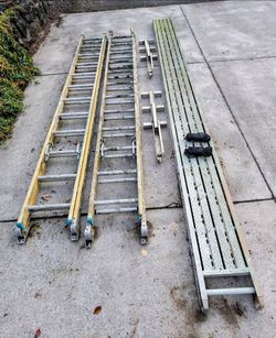 Two 24' Werner Ladders, Walkboard Plank, Jacks, Ropes
