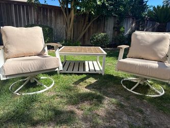 2 Hampton bay swivel rocking chairs and table