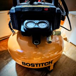 Bostitsch  150psi  New With New Hose 