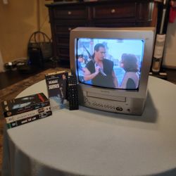 Toshiba  13" CRT TV/VCR Combo - Metalic Silver With Remote Plus Movies