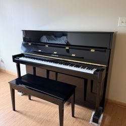 Upright Yamaha piano 