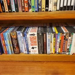 100+ VHS TAPES/100+ DVDs/DVD-VHS PLAYER