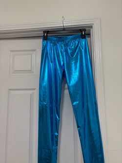 Turquoise girls pants size. Medium or