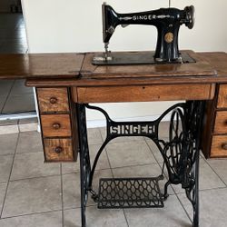 Antique Singer Seeing Machine And Cabinet