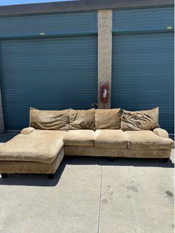 Robert Michael feather tan sectional