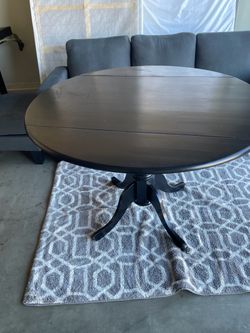 Round wooden dining table