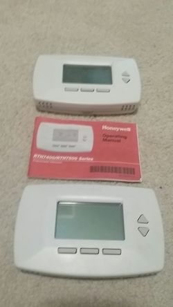 2 Honeywell programmable thermostats with operating manual