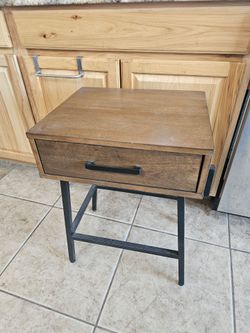 Wood and metal nightstand or side table in good condition