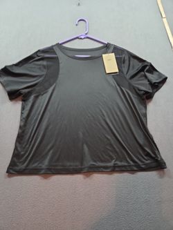 women's black short-sleeve athletic shirt by Nike Yoga size L