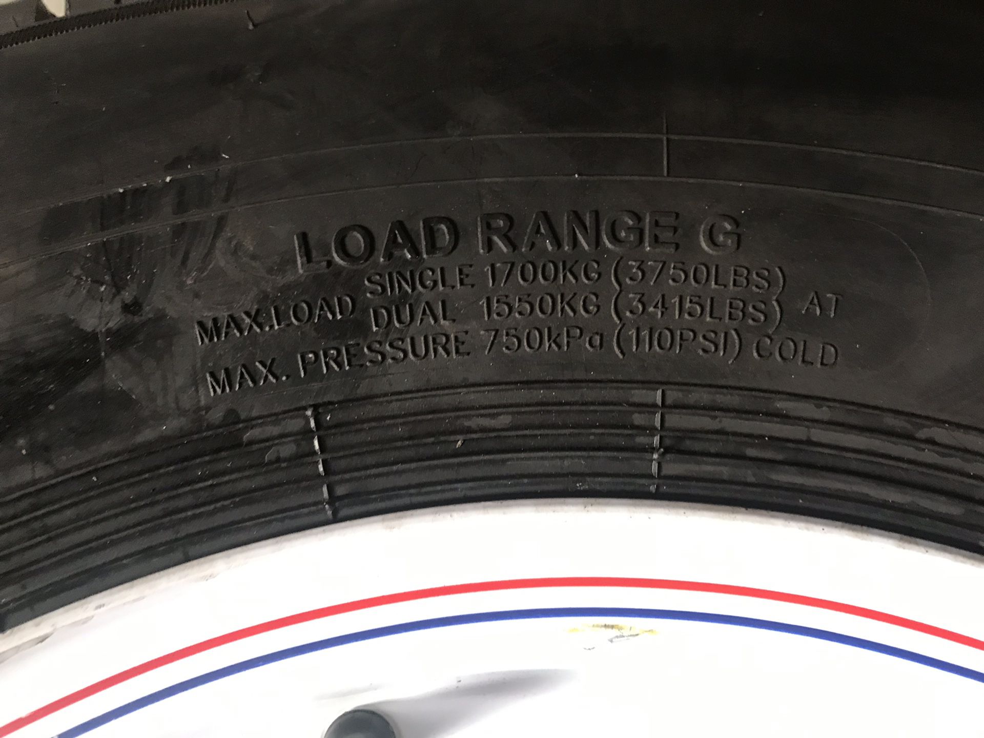 One ST trailer tire 235x75-16 14 ply with 8 lugs rim $150