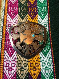 18k 925 silver pendant that can also be worn as a brooch. $90