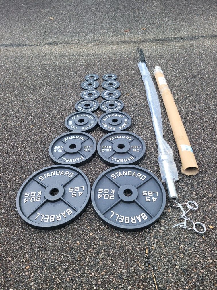 NEW IN BOX Olympic Plates-255lbs & 6ft Barbell