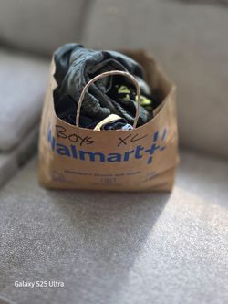 Bags of kids clothes:boys Xl and L. Girls Xl and L.