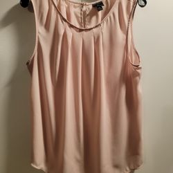 Sleeveless blouse in light pink size XL