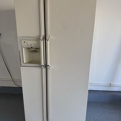 FREE- GE Refrigerator side by side works great and gets cold
