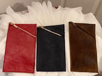 Leather Zipper Pouches  Each one $75
