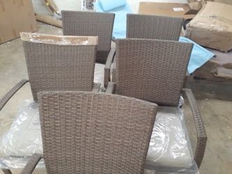 new 5 wicker chairs cushions included