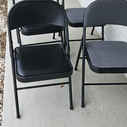 Four Folding Chairs