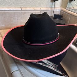 Black and pink cowboy hat made by Bailey. Size 6 7/8